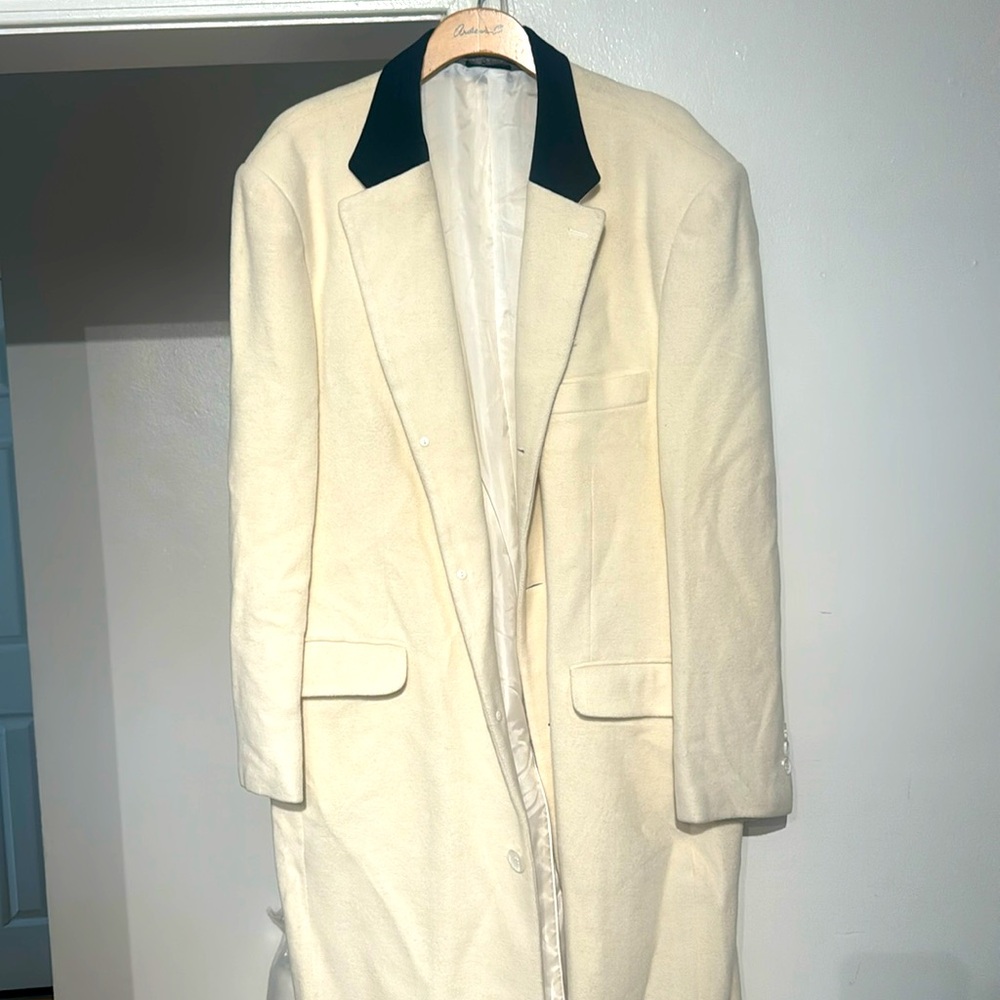 This a man overcoat that is ankle length. It is a 42R.